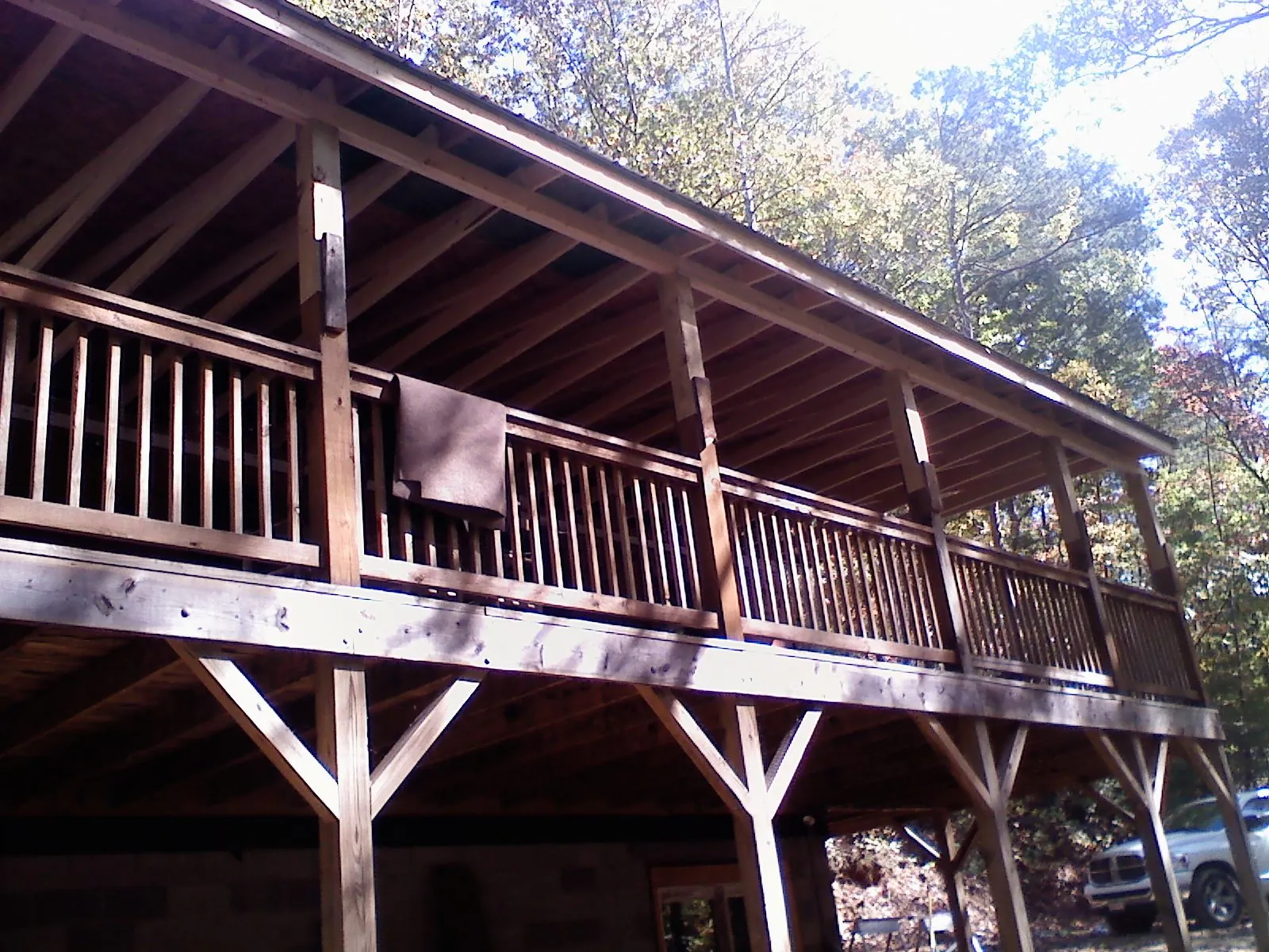 Timber framing under a new elevated porch and deck — Roof Leak Repair in Powder Springs by Roofing Brothers